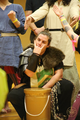 Sum'n shows her hand sign for "orc tusks" at Rat Bash '26.